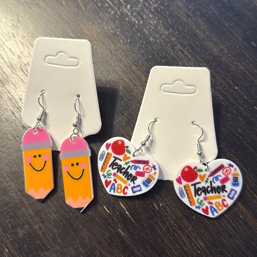 2 pairs of women’s fashion earrings teacher heart books pencils​